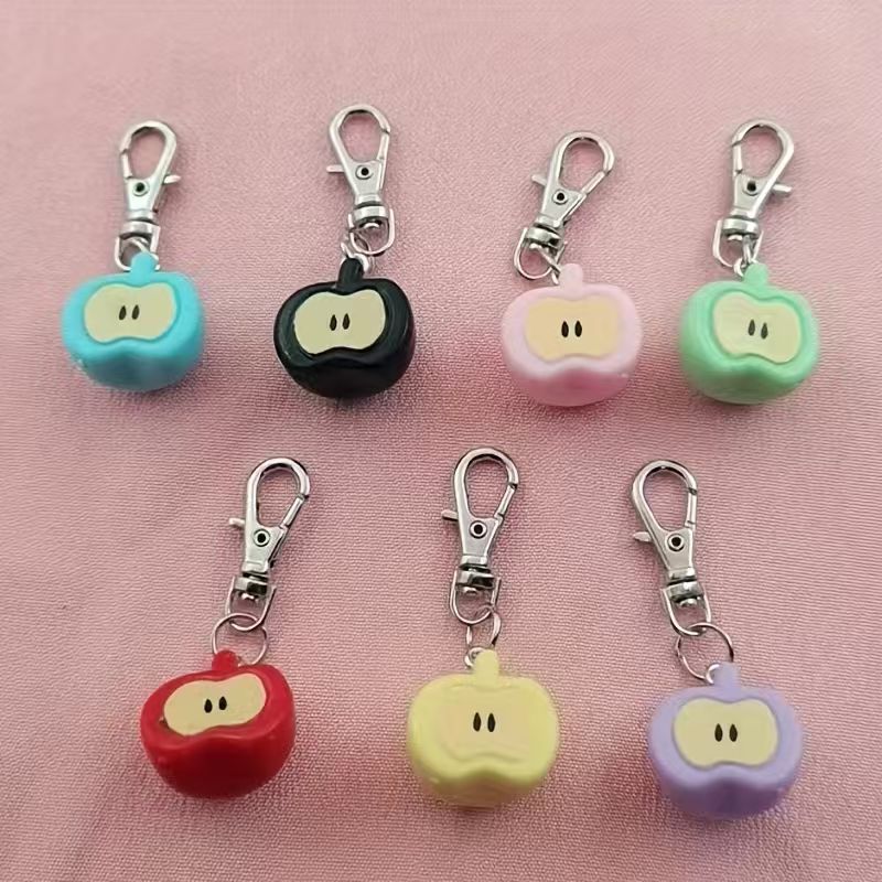 7-teiliges Set aus Kunstharz-S – Phone Accessories Keychain Bewertung und Preis