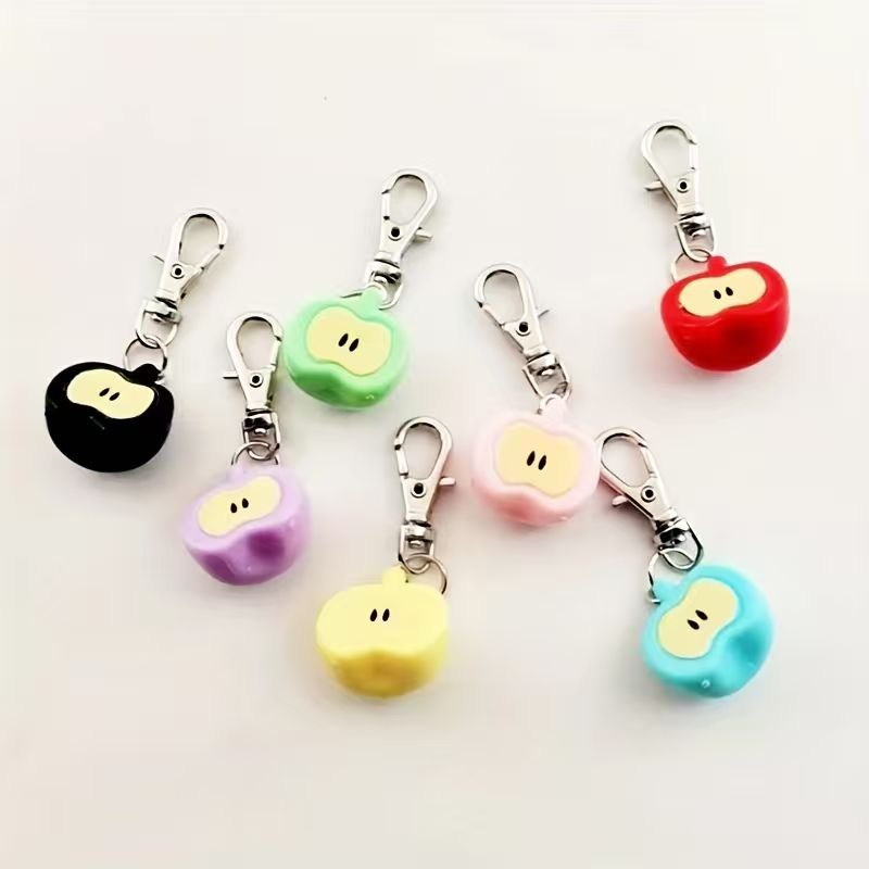 7-teiliges Set aus Kunstharz-S – Phone Accessories Keychain Bewertung und Preis